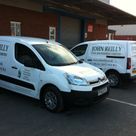 A civil engineering vehicle fleet with vinyl decorated logos and trade associations 
