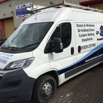 Part of a company fleet, vinyl decorated vehicle with contact details and a bespoke 'corporate designed' colour printed swoosh along the sides